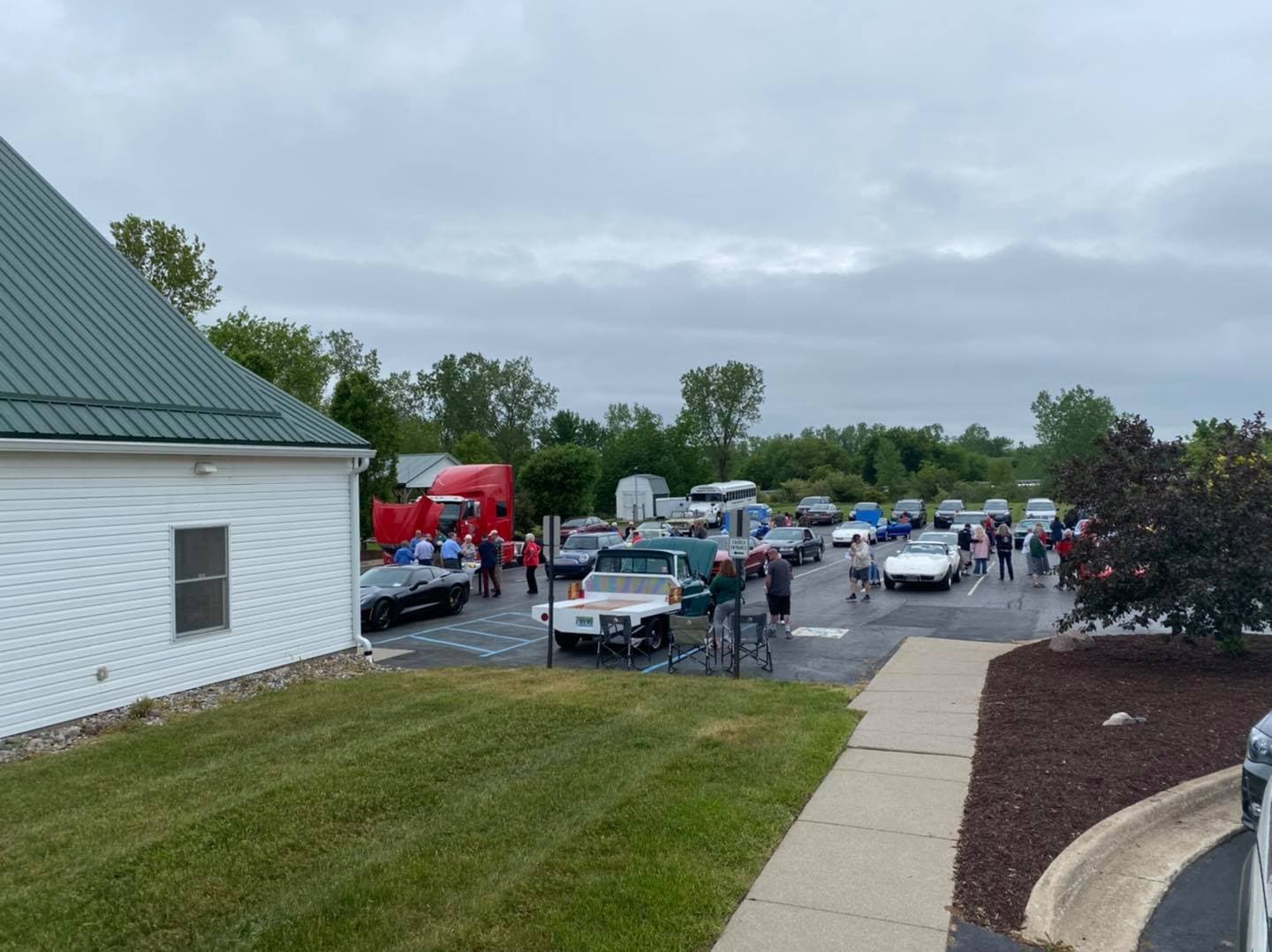 Classic cars lined up outside the church for the Car Show for Christ